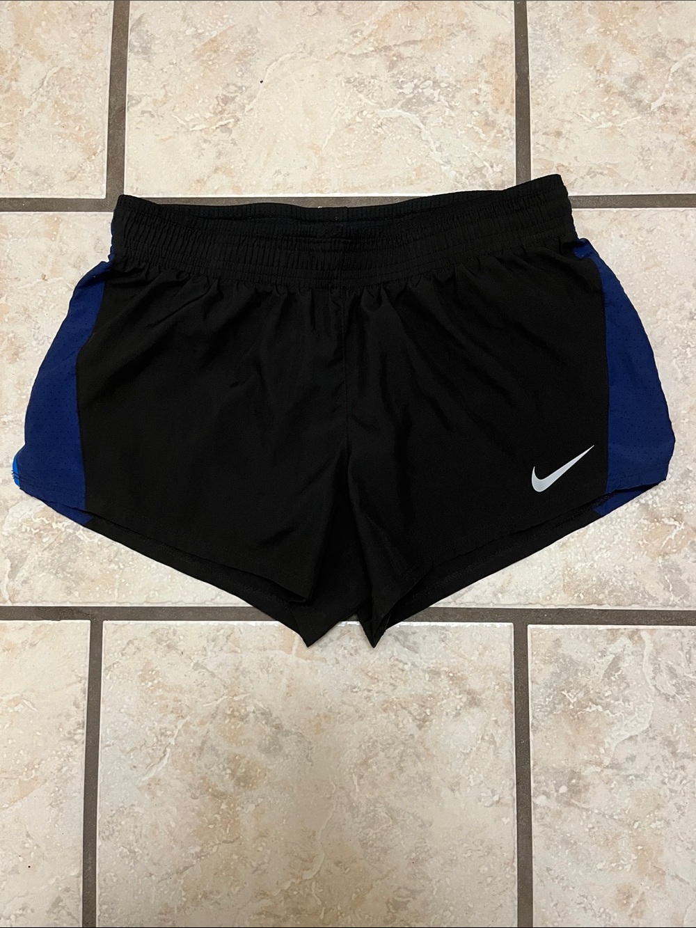 Nike Women’s Lined Black Shorts with Blue Side Panels